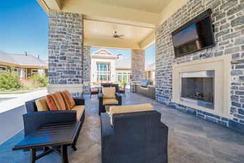 Grand pavilions with outdoor grills, tv's, and fireplace gathering area